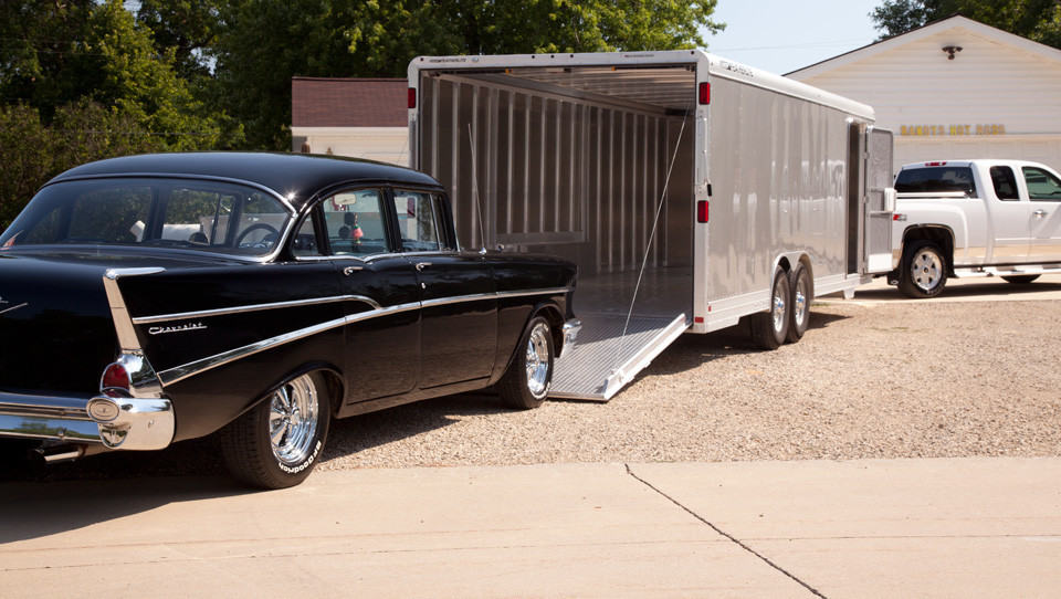 picture of a restomod going into a car trailer