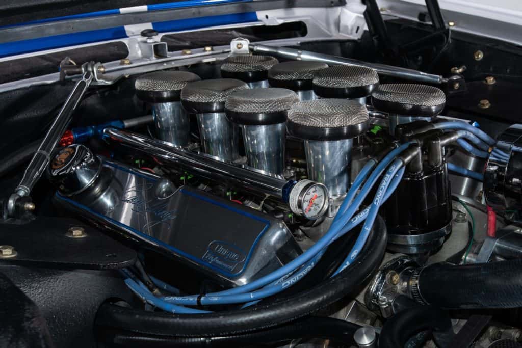 This is the picture of an engine in a 1965 Ford Shelby Mustang GT350SR Restomod