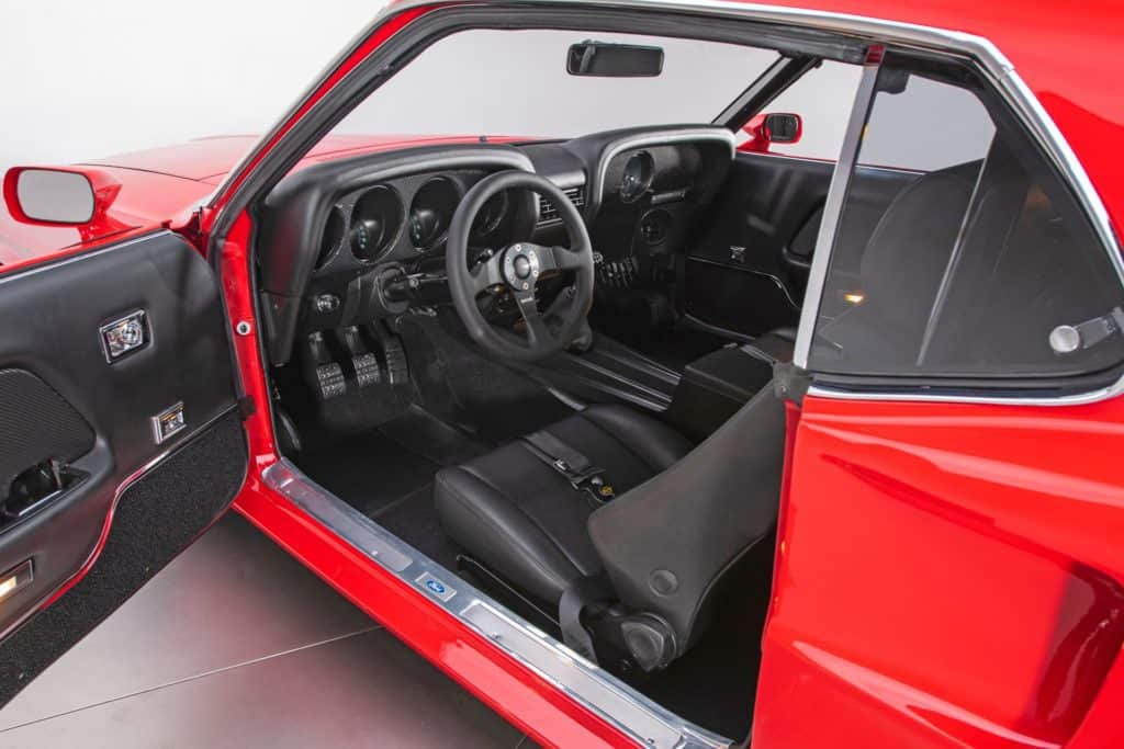the interior of the 1969 ford mustang restomod